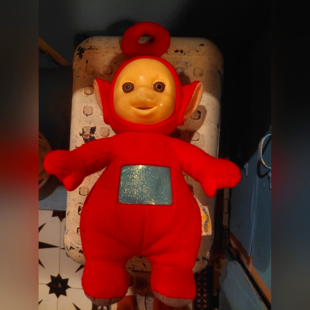 Vibrant Red Plush Toy with Interactive Screen